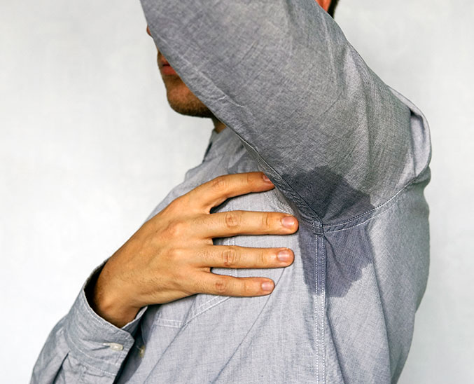 man sweating problem hyperhidrosis